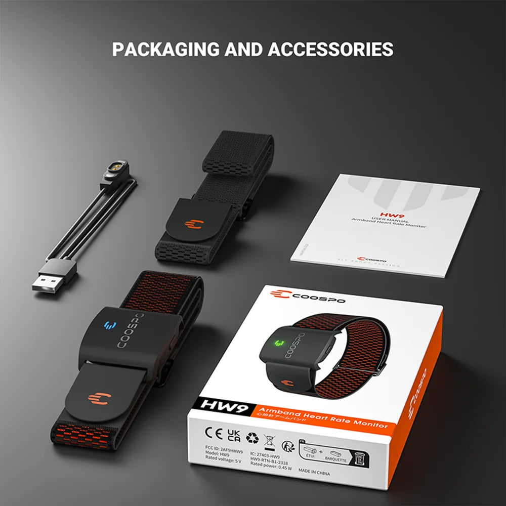 Armband heart rate monitor with gray sensor module and orange strap