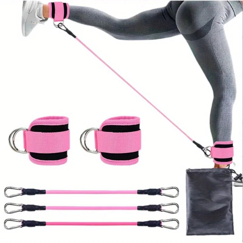 Pink leg resistance band with two ankle cuffs and attached handles, shown on gray leggings