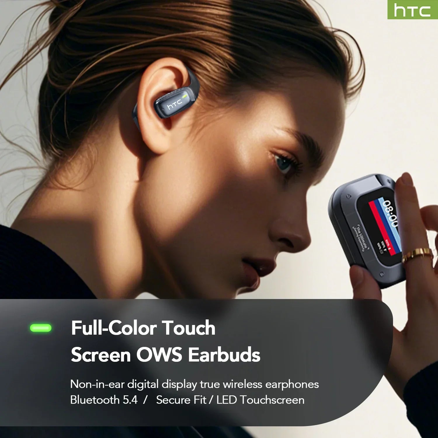 Black wireless earbuds with charging case, one earbud shown being worn