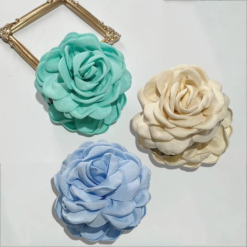 Fabric rose hair claw clips in teal, cream, and light blue (3)