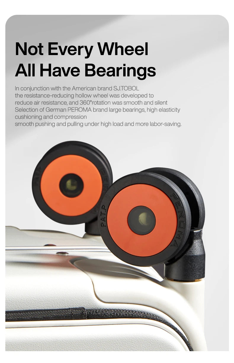 Carry-on trolley suitcase wheel close-up with orange bearing rings and gray tire