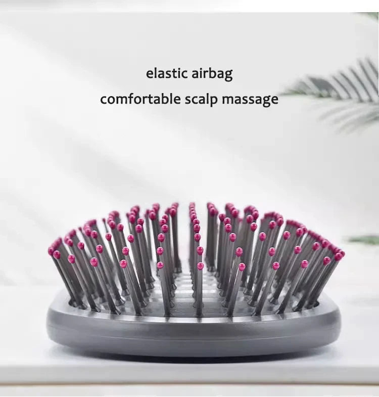 Scalp massage airbag hair comb with round head and pink-tipped pins