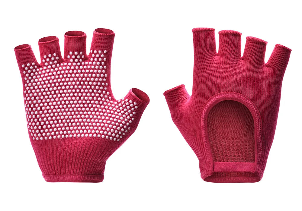 Rose red half-finger yoga gloves with white grip dots and knuckle cutout