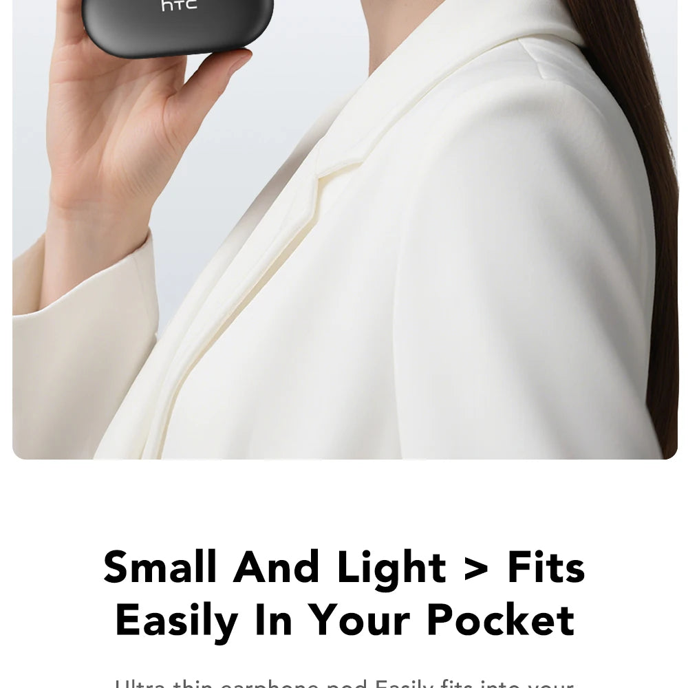 Black wireless earbuds held near a model wearing one in ear