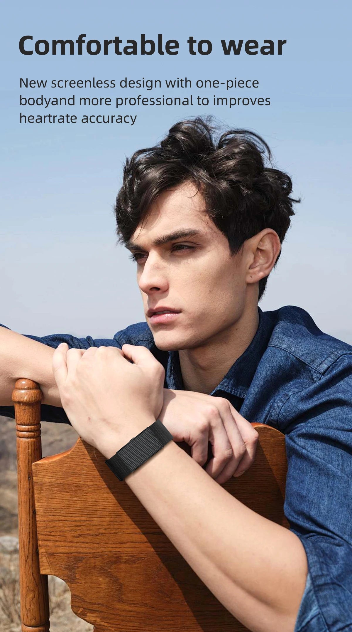 Black fitness bracelet on man’s wrist with dark watch face