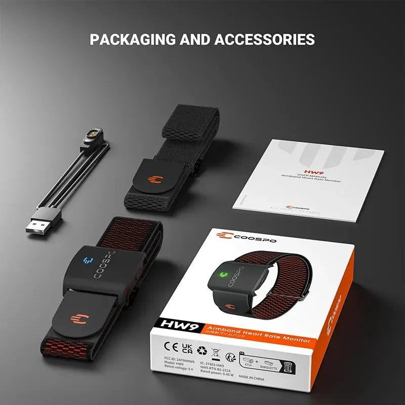 HW9 armband heart rate monitor packaging with accessories and black charging strap