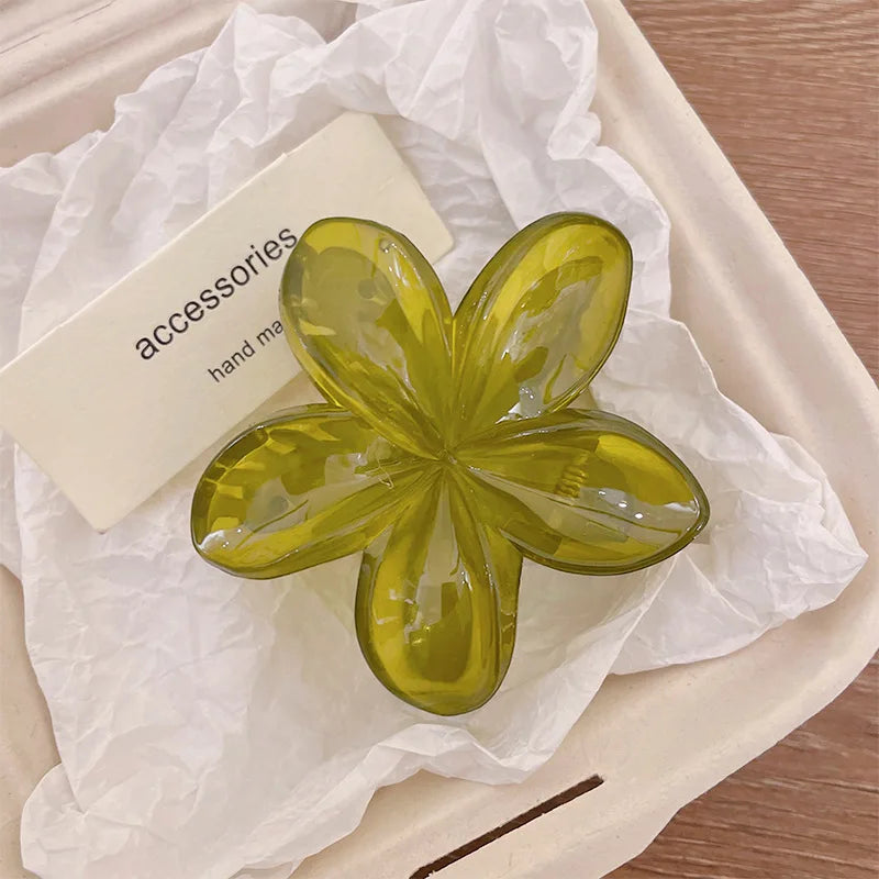 Hawaiian gradient flower hair claw clip with translucent yellow-green petals