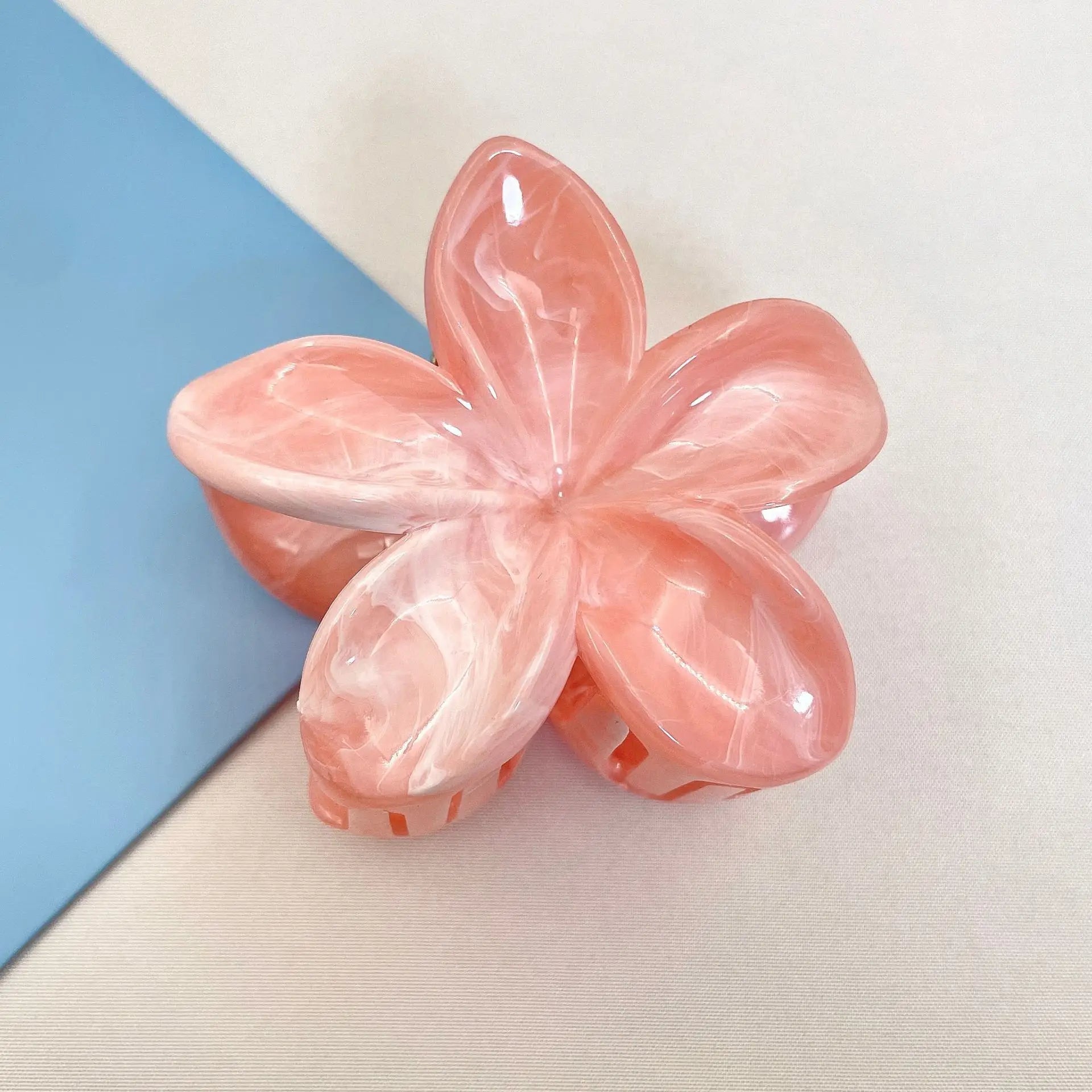 Pink plastic flower hair claw clip with non-slip barrette base