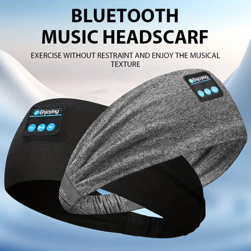 Grey sports headband headphones with side control panel and ear speaker pads