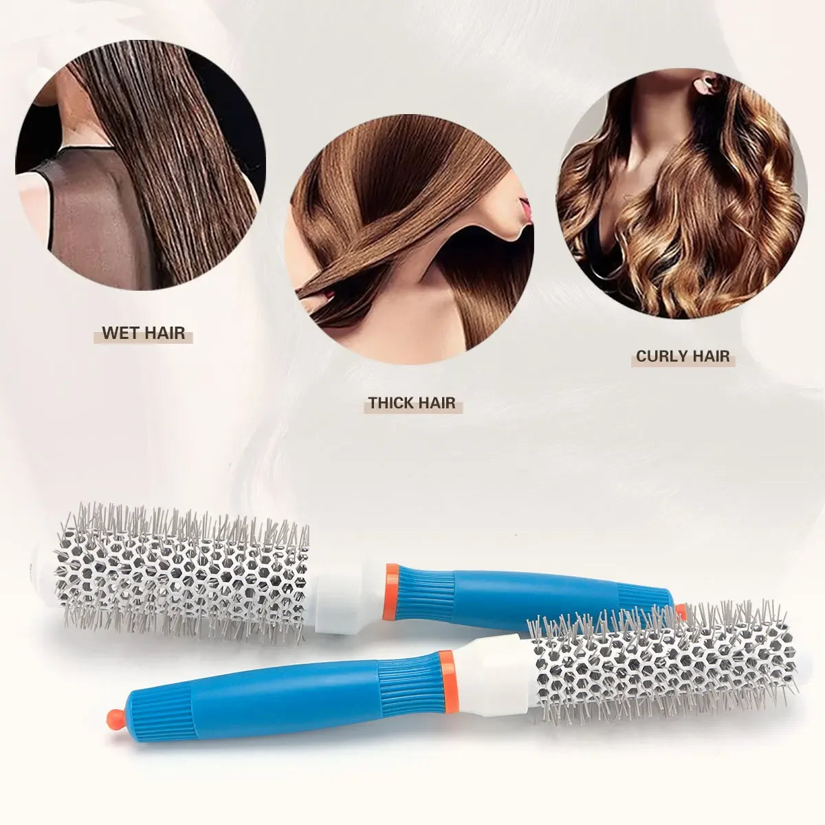 Two round barrel hair brushes with silver bristle heads and teal handles