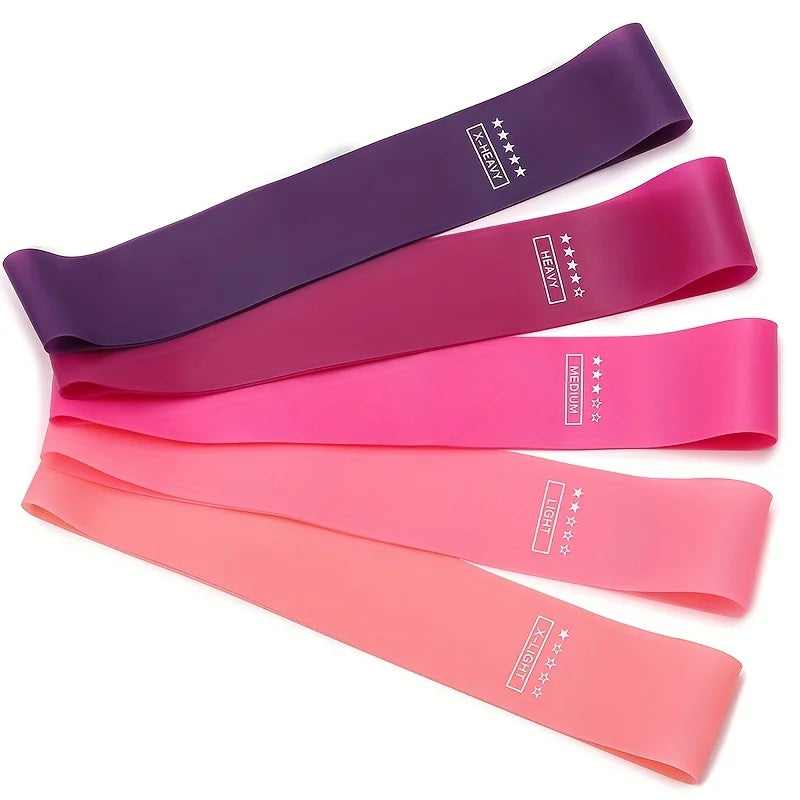 Three resistance bands in purple, fuchsia, and coral pink with strength labels