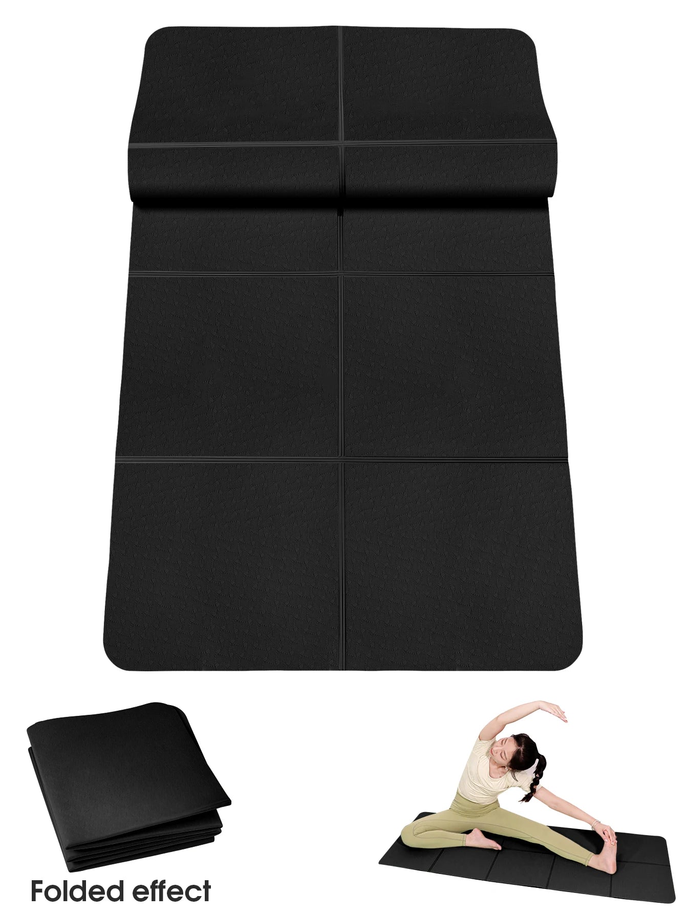 Black foldable yoga mat with grid-like fold lines, folded for compact storage.