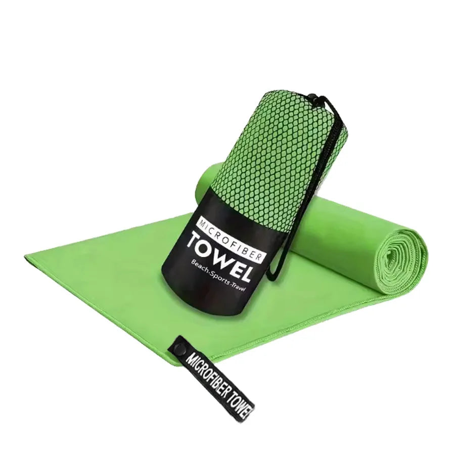 Microfiber yoga gym towel in fluorescent green, folded with rolled matching towel