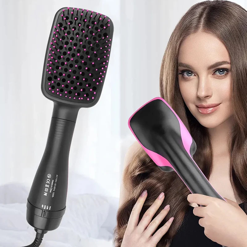 Black and pink hot air brush hair dryer with square bristle head and vented pad