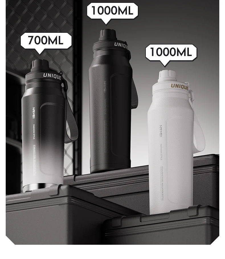 Insulated sports water bottles, black and white, with flip-top lids and carry loop