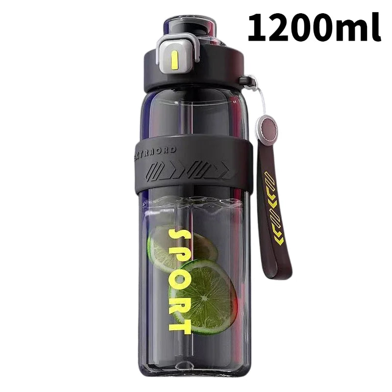 Sports water bottle with straw, 1200ml capacity, dark lid and side carry strap