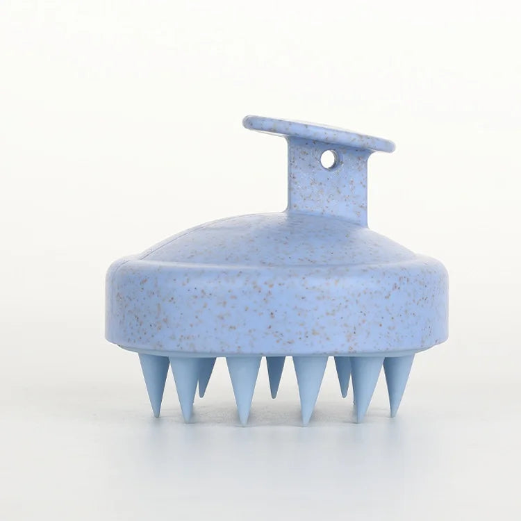 Blue silicone scalp massage shampoo brush with flexible bristles and handle loop