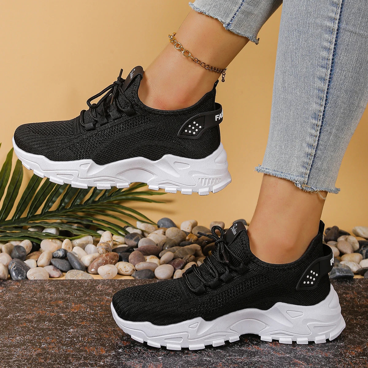 Women's black breathable mesh athletic sneakers with thick white sole (pair)