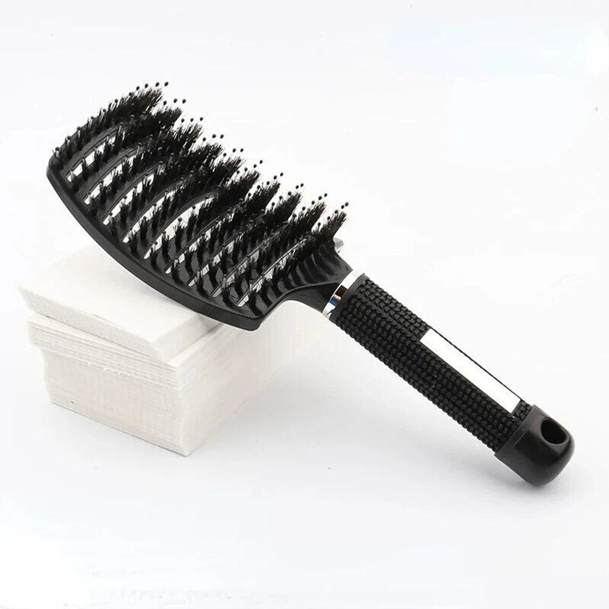 Black detangling hairbrush with boar bristle pins and textured non-slip handle