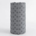 Yoga mat towel rolled in dark grey with small dotted floral pattern
