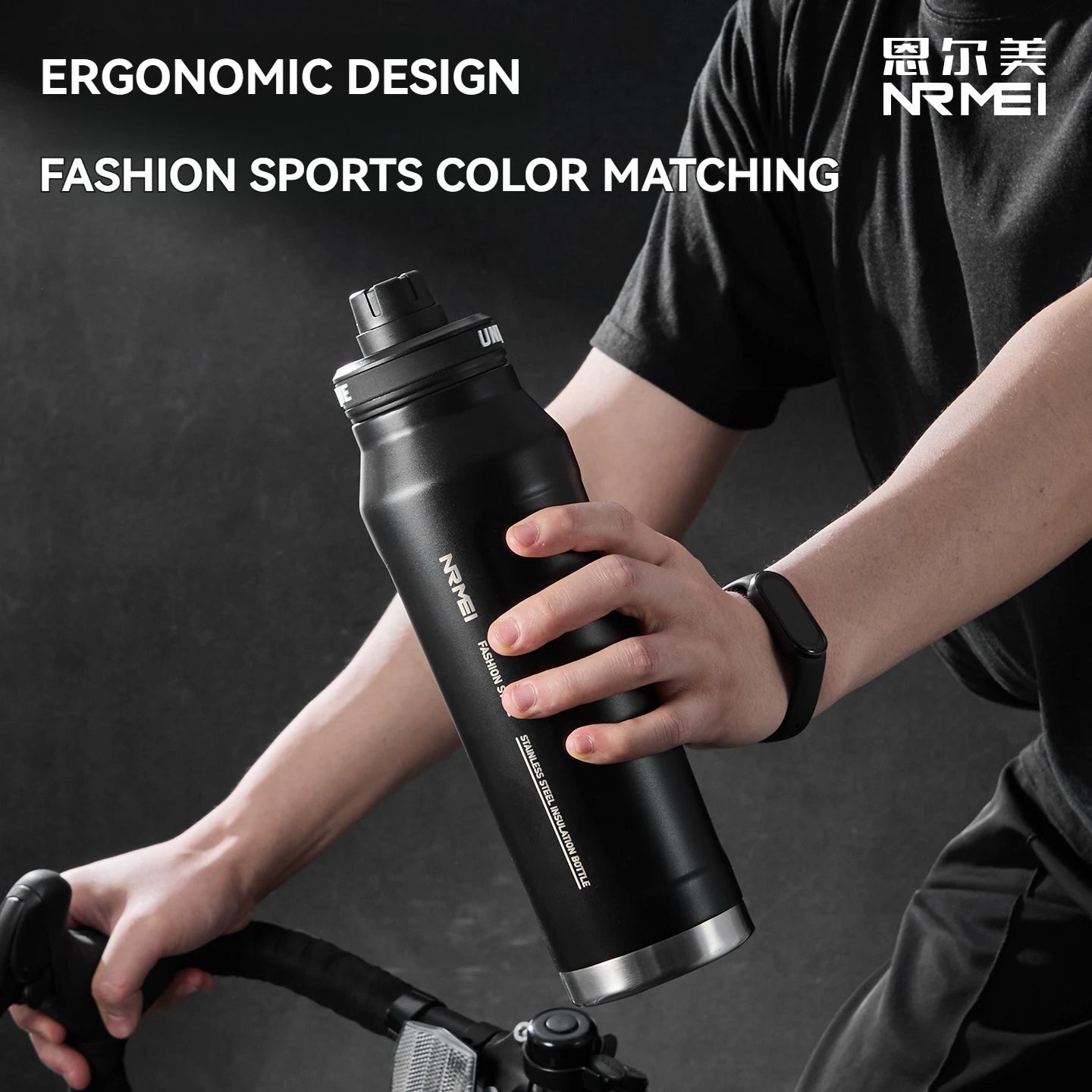 Black insulated stainless steel sports water bottle held in one hand