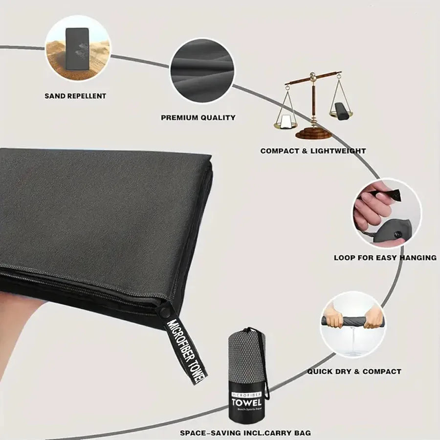 Dark gray microfiber towel with carry bag and hanging loop detail