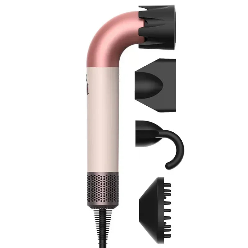Pink and cream hair dryer with black nozzle attachments, close-up of dryer head