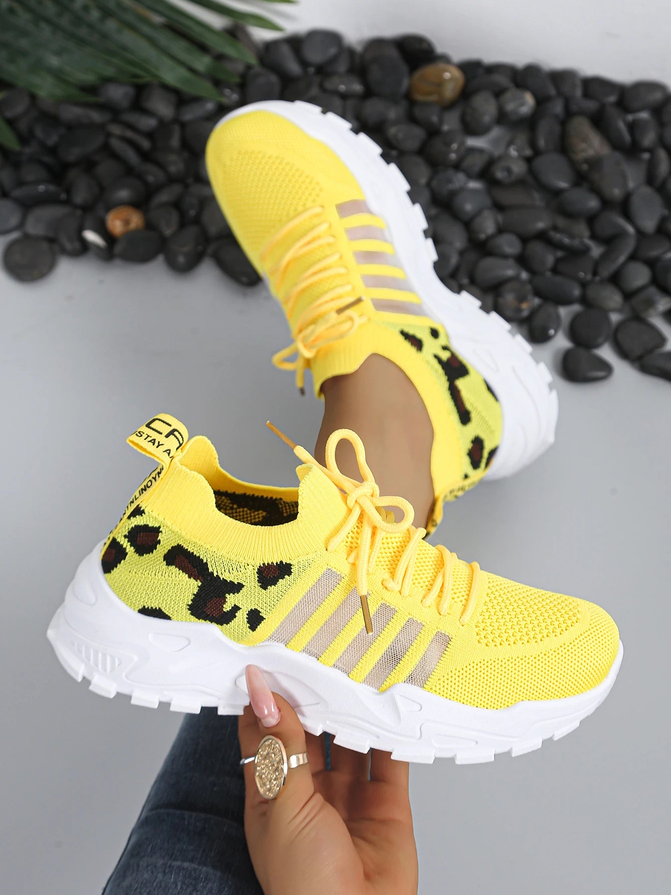 Women's leopard print athletic sneakers, bright yellow knit upper and thick white sole