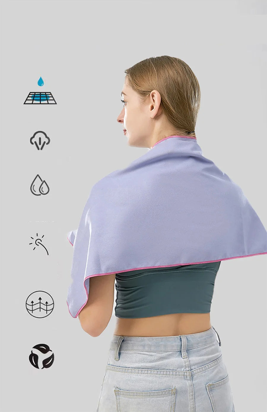 Quick-Dry microfiber sports towel Cedar & Moore in lavender with pink trim, draped over shoulders.