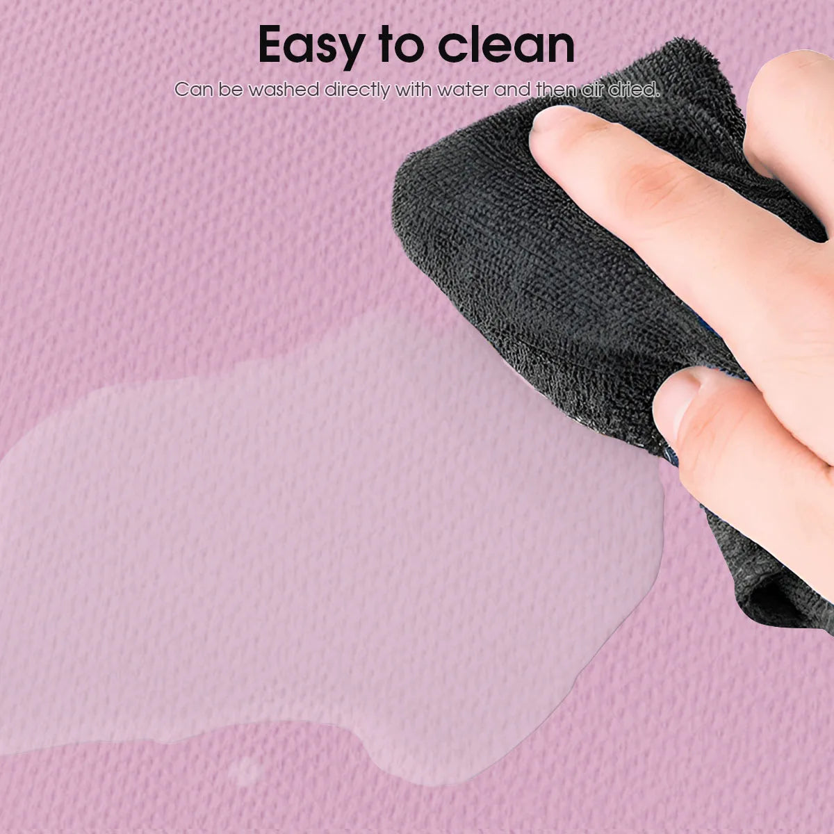 Pink yoga mat texture being wiped with a cleaning cloth