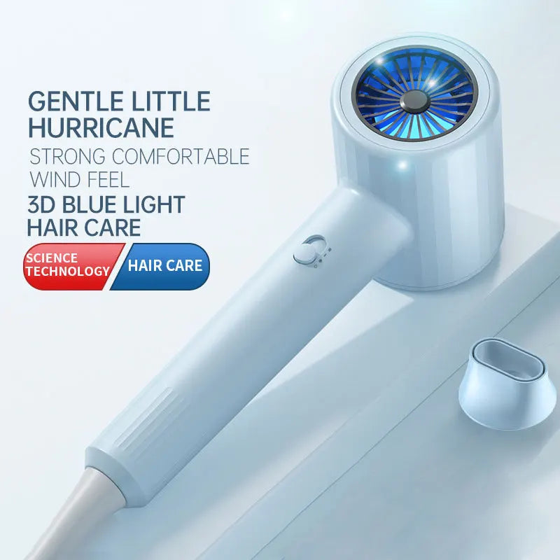 Light blue hair dryer with circular blue vent grille, angled view