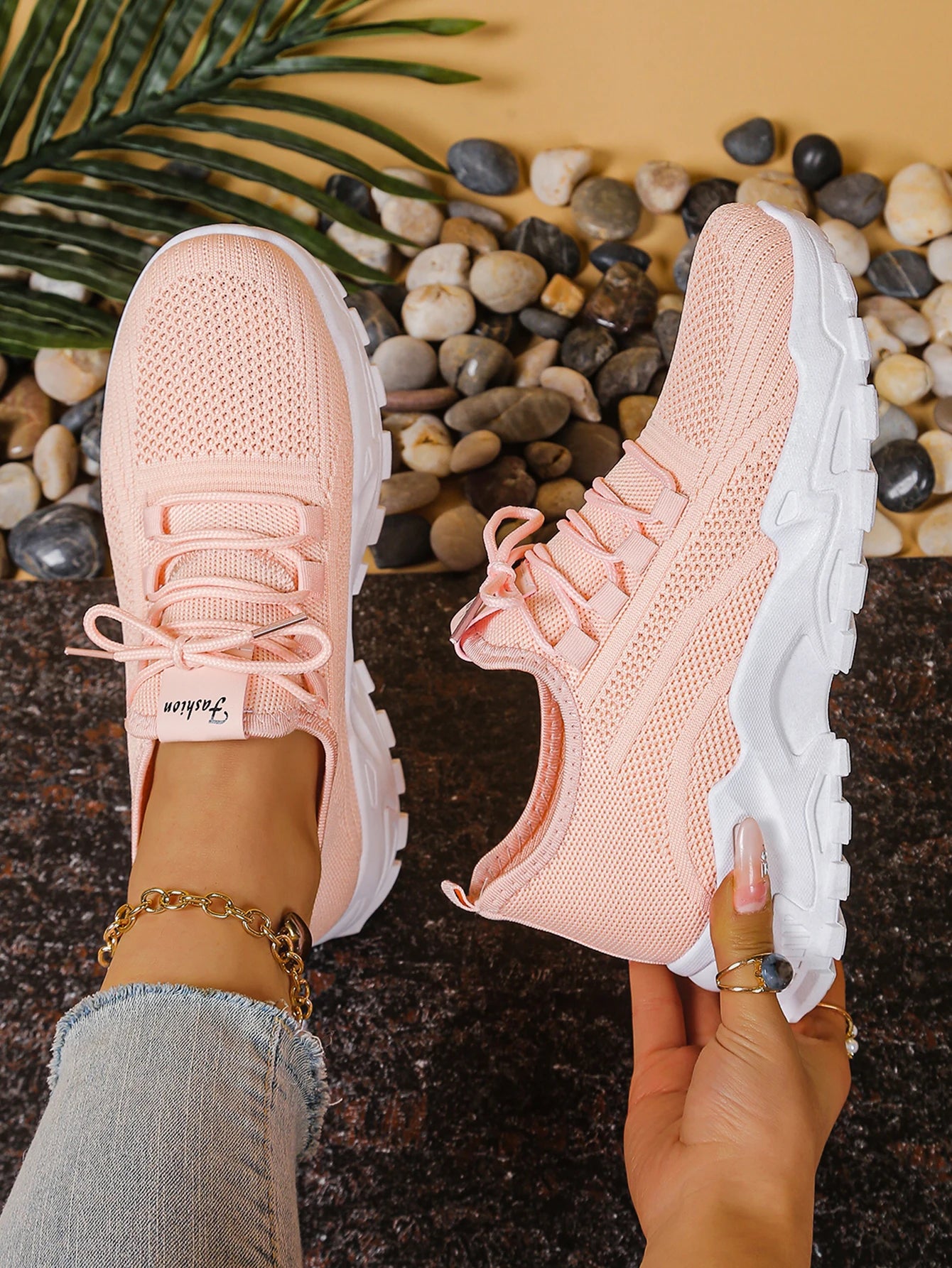 Women's Cedar & Moore pink breathable mesh athletic sneakers with thick white soles, pair.