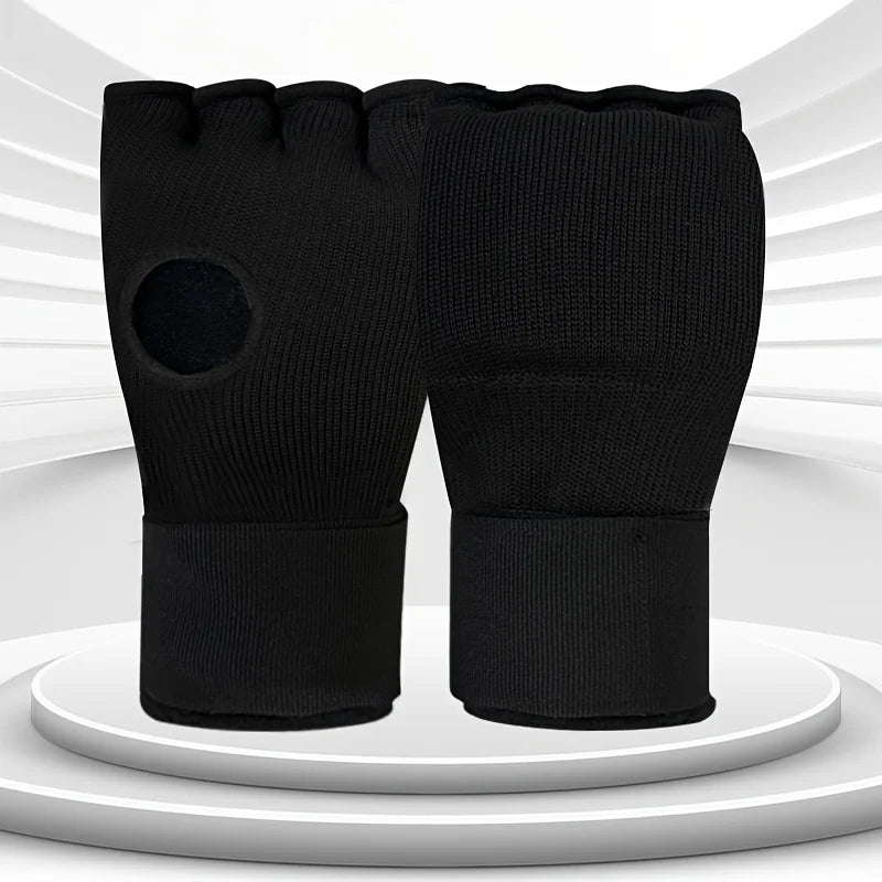 Half-finger boxing gloves in black with thick sponge padding