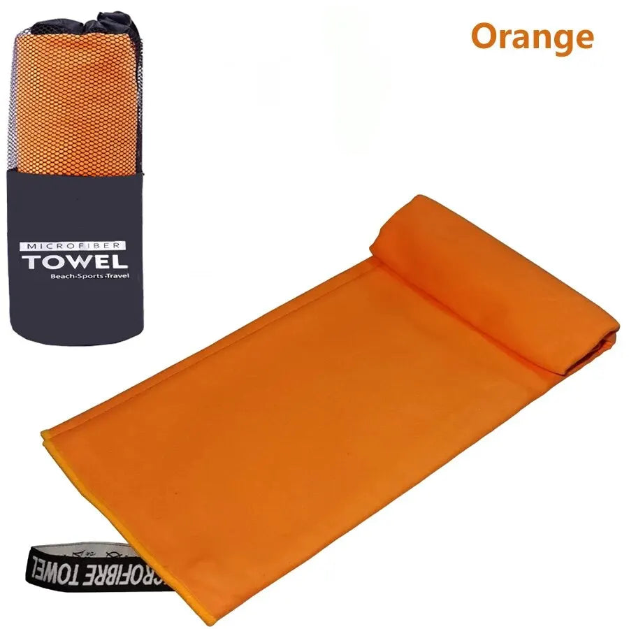 Orange quick-dry microfiber sports towel with storage bag by Cedar & Moore