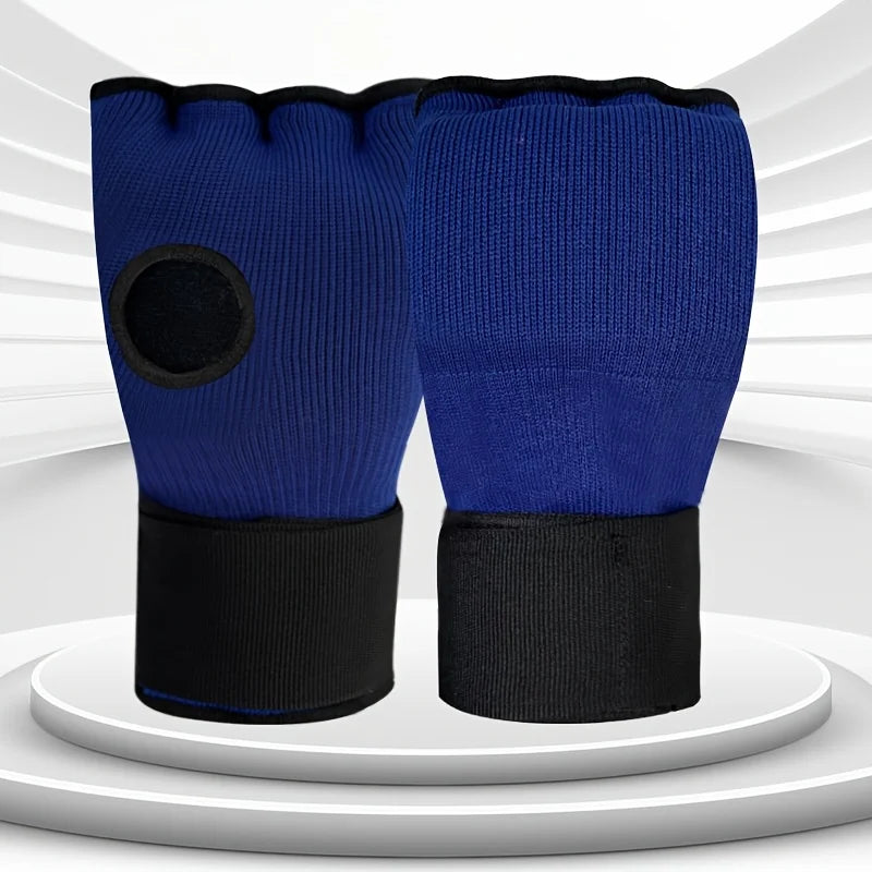 Blue half-finger MMA gloves with black wrist strap and circular knuckle pad