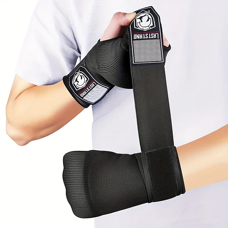 Half finger gel boxing gloves worn on one hand; black knit with open thumb and wrist wrap.