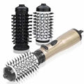 Gold hot air hair dryer brush with two detachable black rotating brush heads