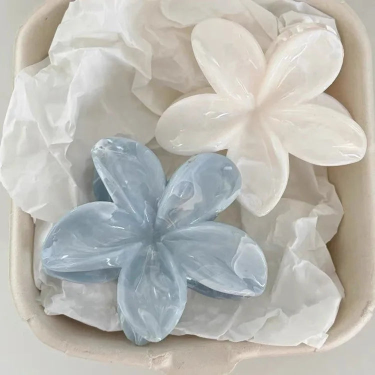 White and pale blue flower hair claw clip set with two glossy five-petal clips