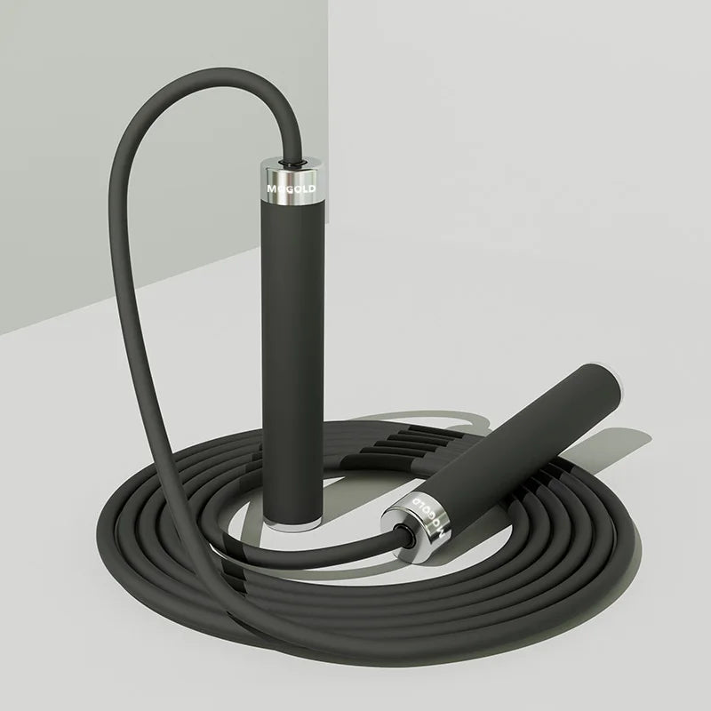 Professional jump rope with black handles and a coiled cord; adjustable dual-bearing speed rope