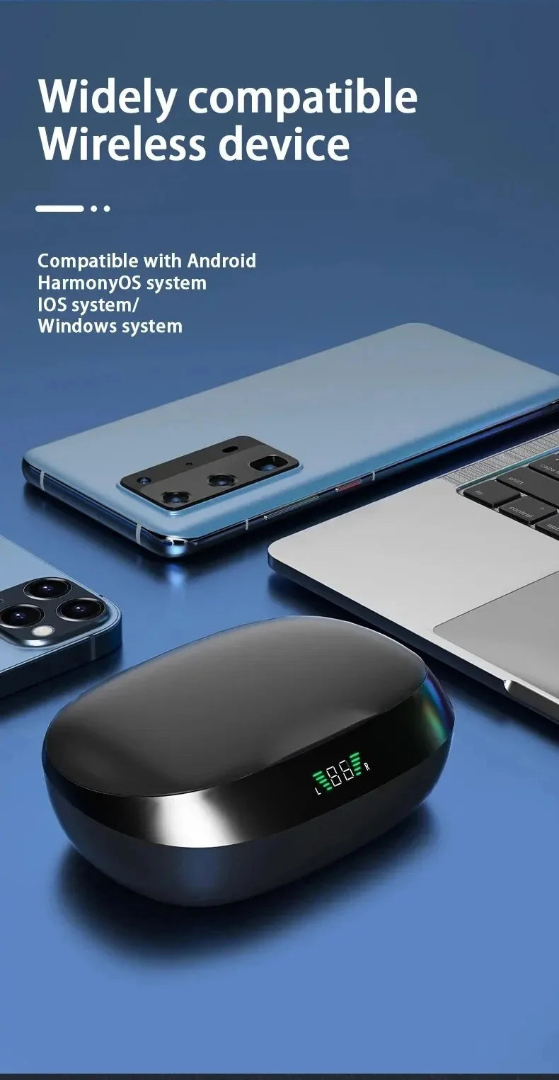 Black wireless earbuds charging case on top of a smartphone and laptop