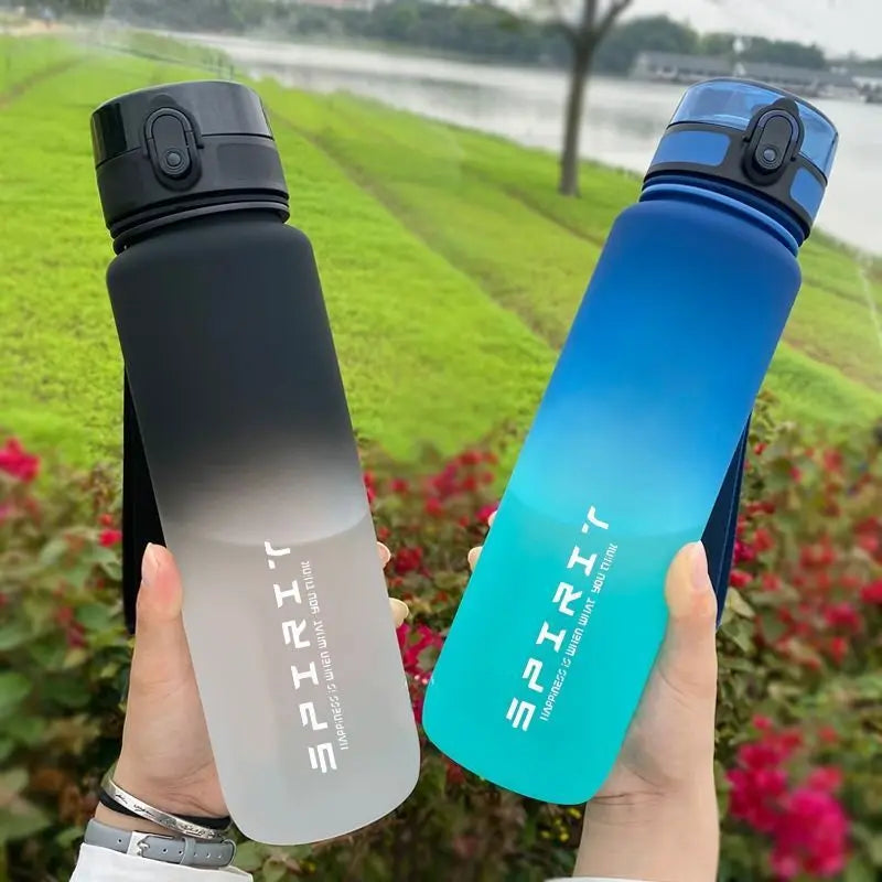 Sports water bottle with straw, black and blue gradient, flip-top lid, gripper body