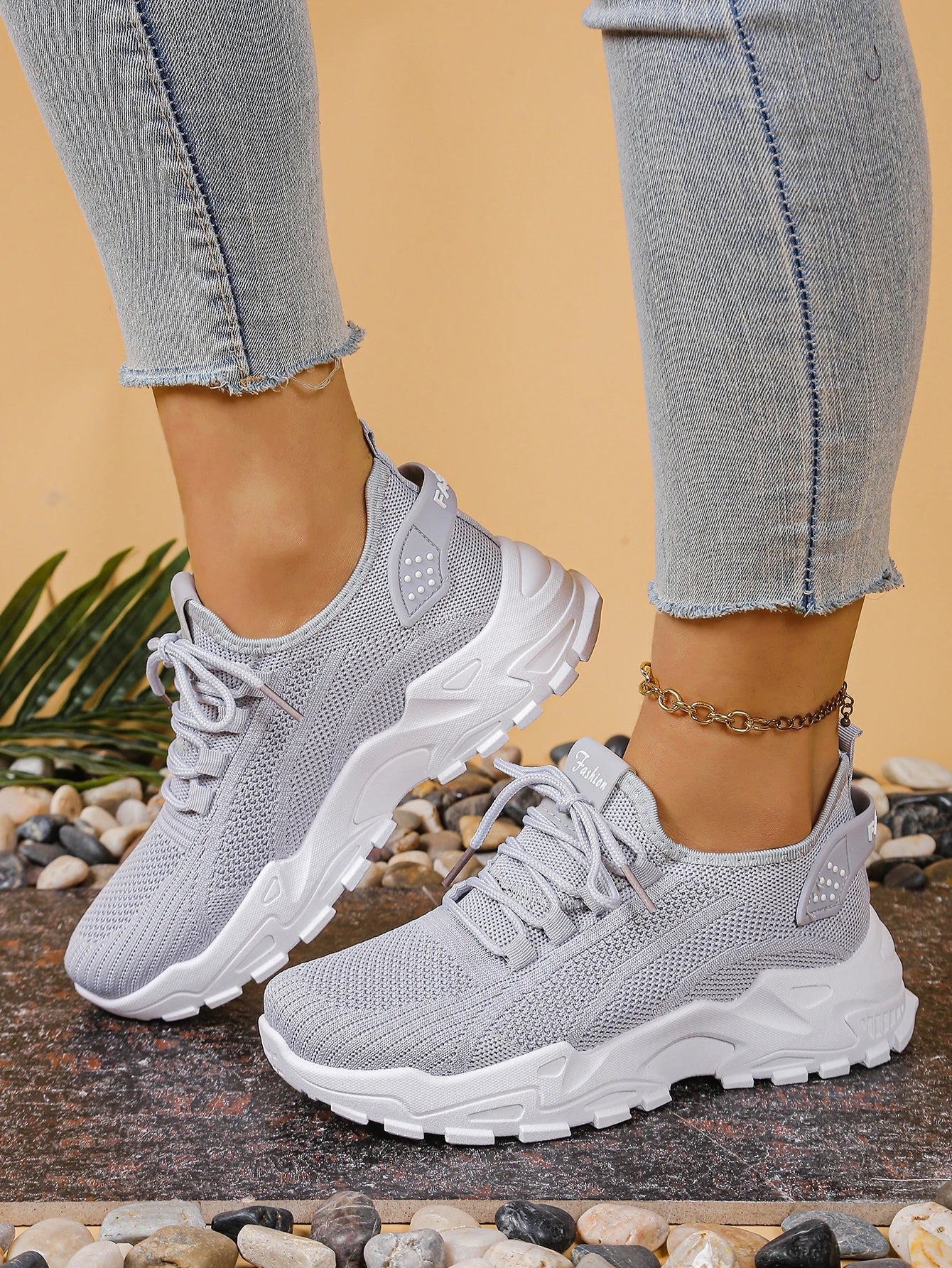 Women's breathable mesh athletic sneakers pair with thick white sole in light gray by Cedar & Moore