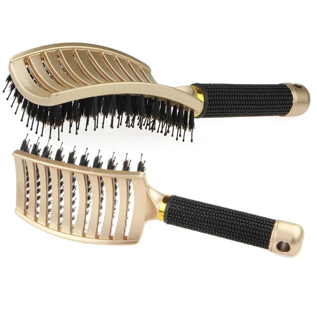 Vented boar bristle detangling hairbrush with black textured grip and gold-toned frame