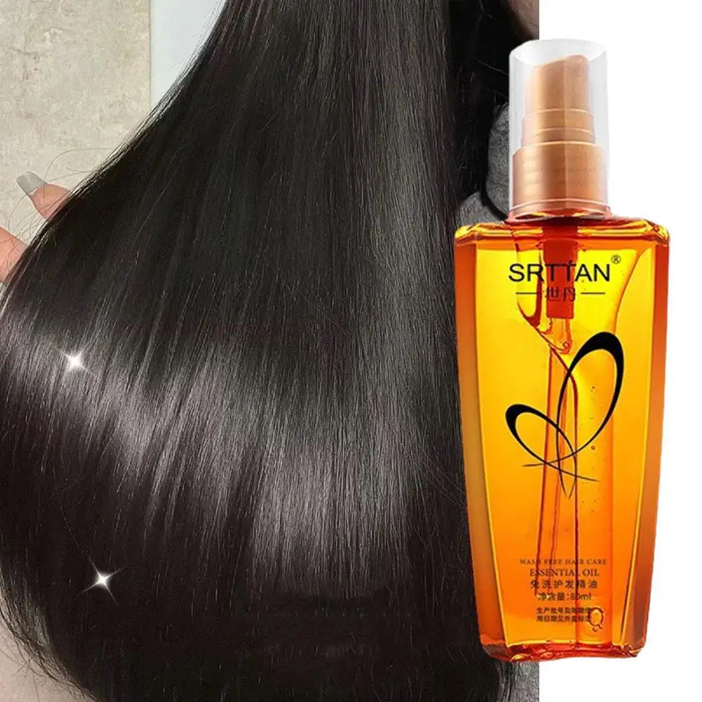 Argan oil hair serum bottle with white pump next to smooth dark hair.