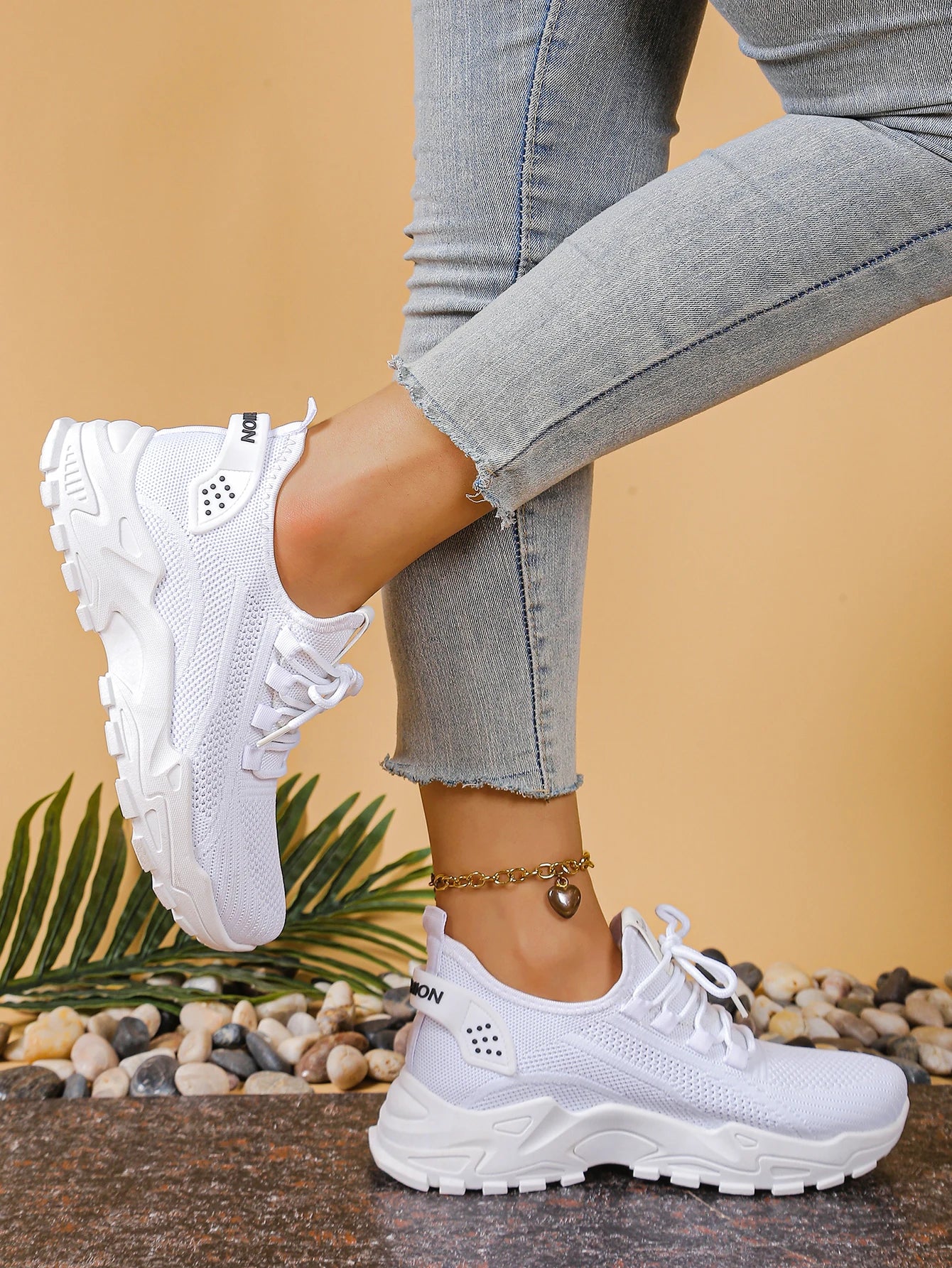 Women's breathable mesh athletic sneakers by Cedar & Moore with thick white sole