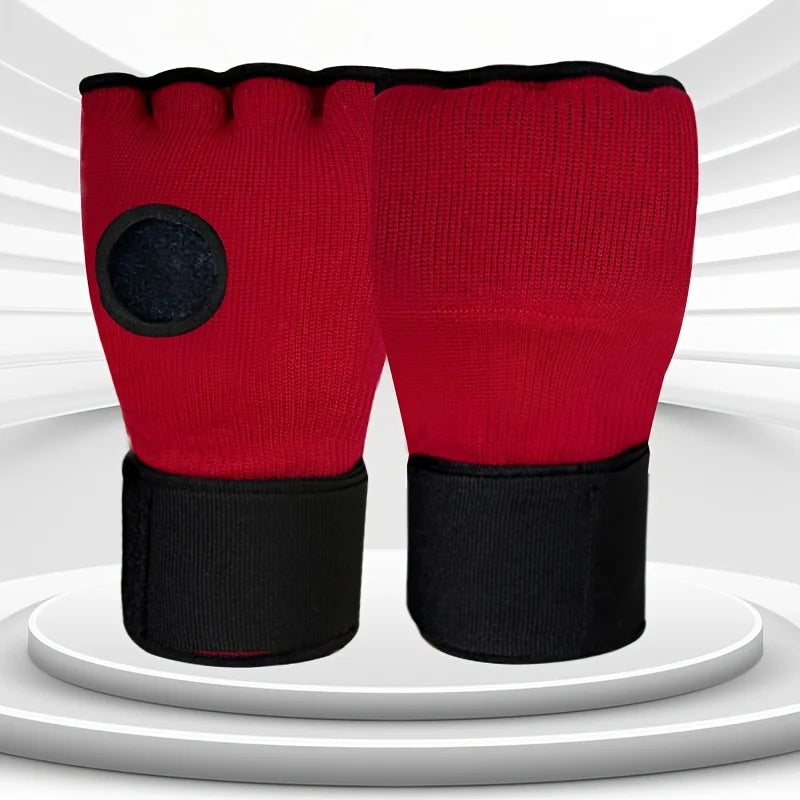 Red half-finger MMA gloves with black wrist strap and circular knuckle pad