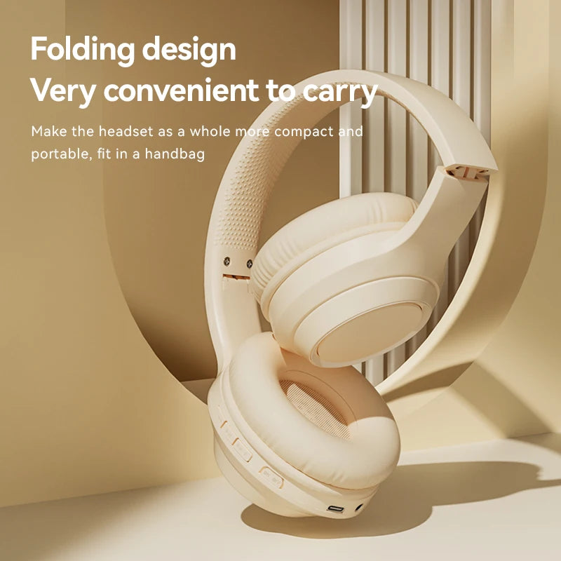 Foldable white over-ear headphones with stacked padded earcups for easy carrying.