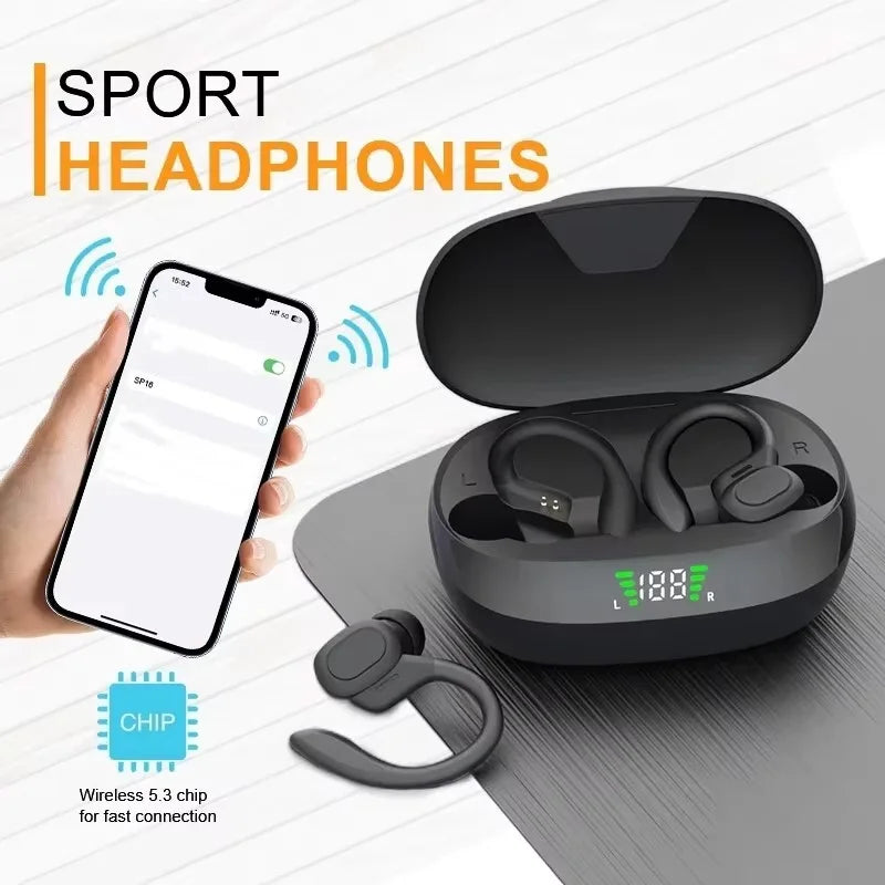 Black sport earbuds with ear hooks, open charging case beside smartphone