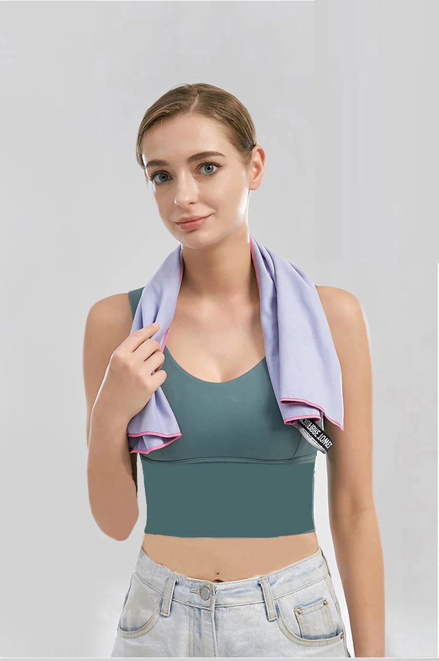 Cedar & Moore Quick-Dry Microfiber Sports Towel in lilac with pink trim draped over model