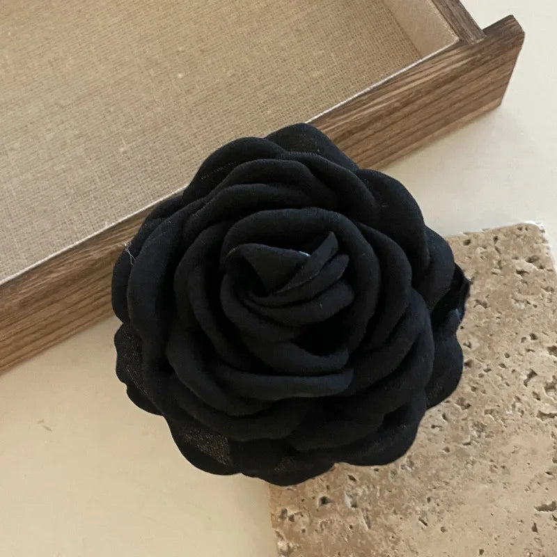 Black fabric rose hair claw clip, rosette flower on barrette